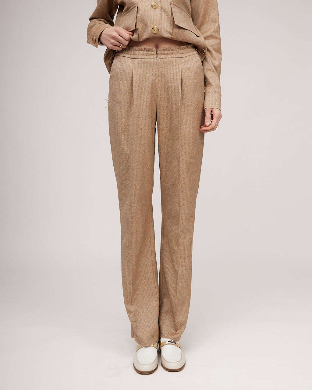 Classic pants with elastic waistband, fasteners and metallic sheen | KIARA Nolo Store