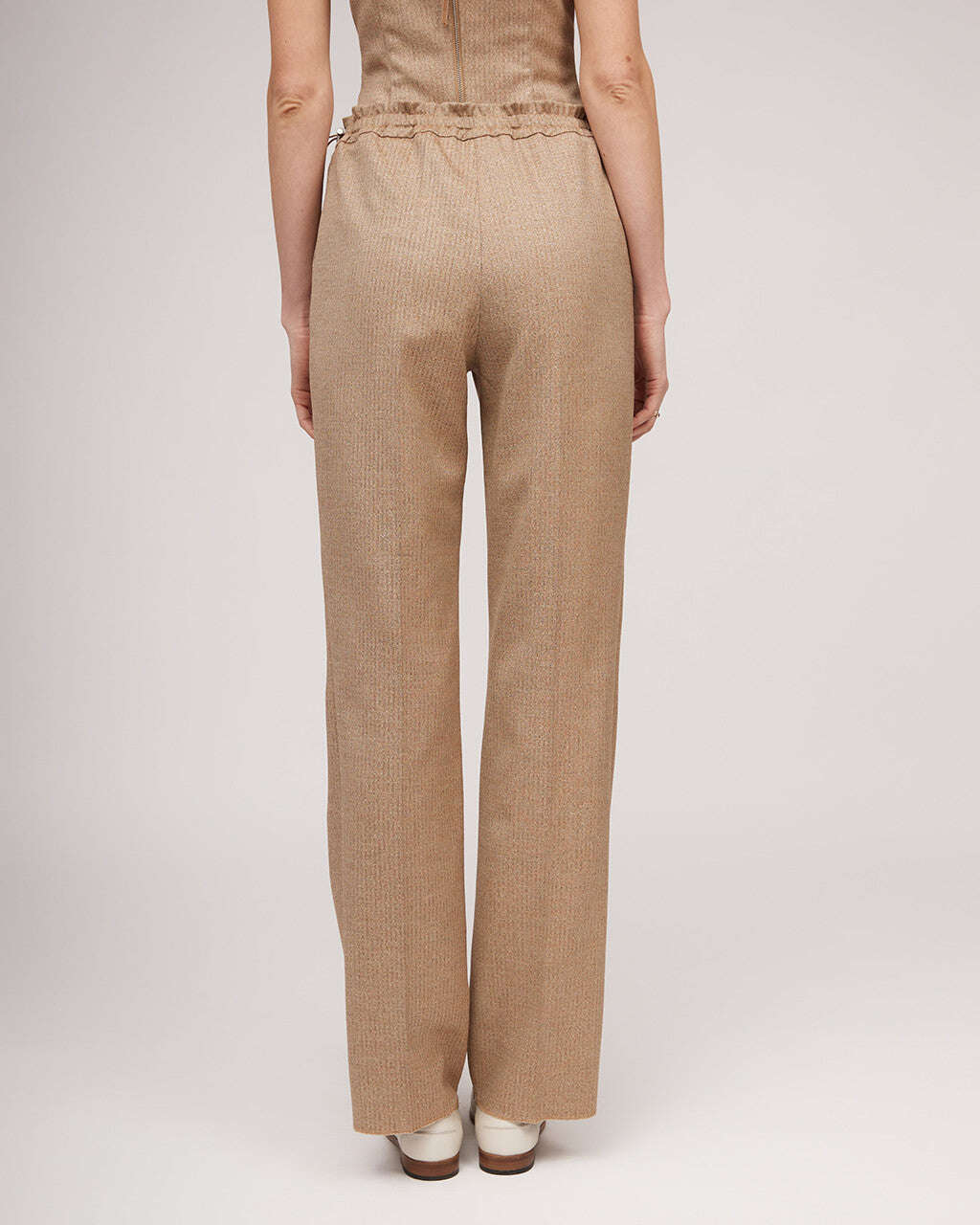Classic pants with elastic waistband, fasteners and metallic sheen | KIARA Nolo Store