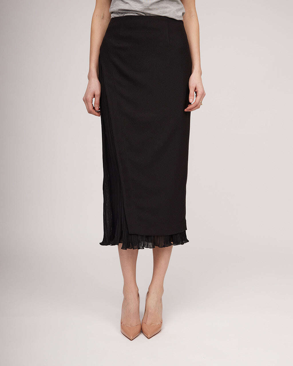 Black midi length skirt with a distinctive silhouette and pleats | IRENE Nolo Store