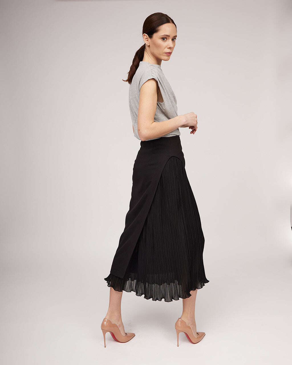 Black midi length skirt with a distinctive silhouette and pleats | IRENE Nolo Store