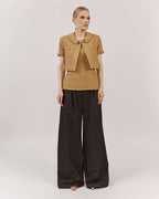 Lightly lined wool-viscose blazer with hidden chest pockets and a single-button front in a loose, oversized fit.