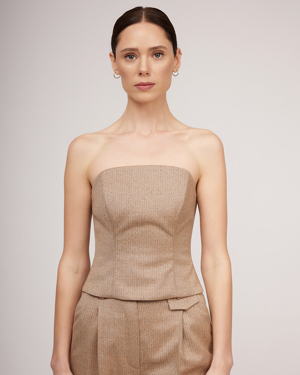 Pieguļoša korsete ar nelielu metālisku spīdumu | ĒRĒNA