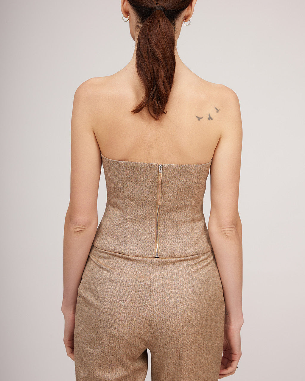 Pieguļoša korsete ar nelielu metālisku spīdumu | ĒRĒNA