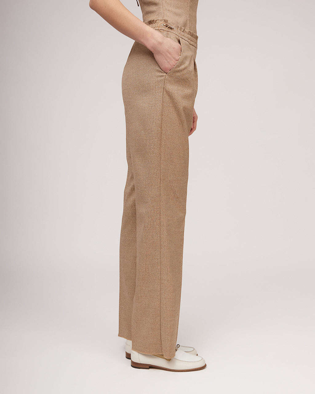 Classic pants with elastic waistband, fasteners and metallic sheen | KIARA Nolo Store