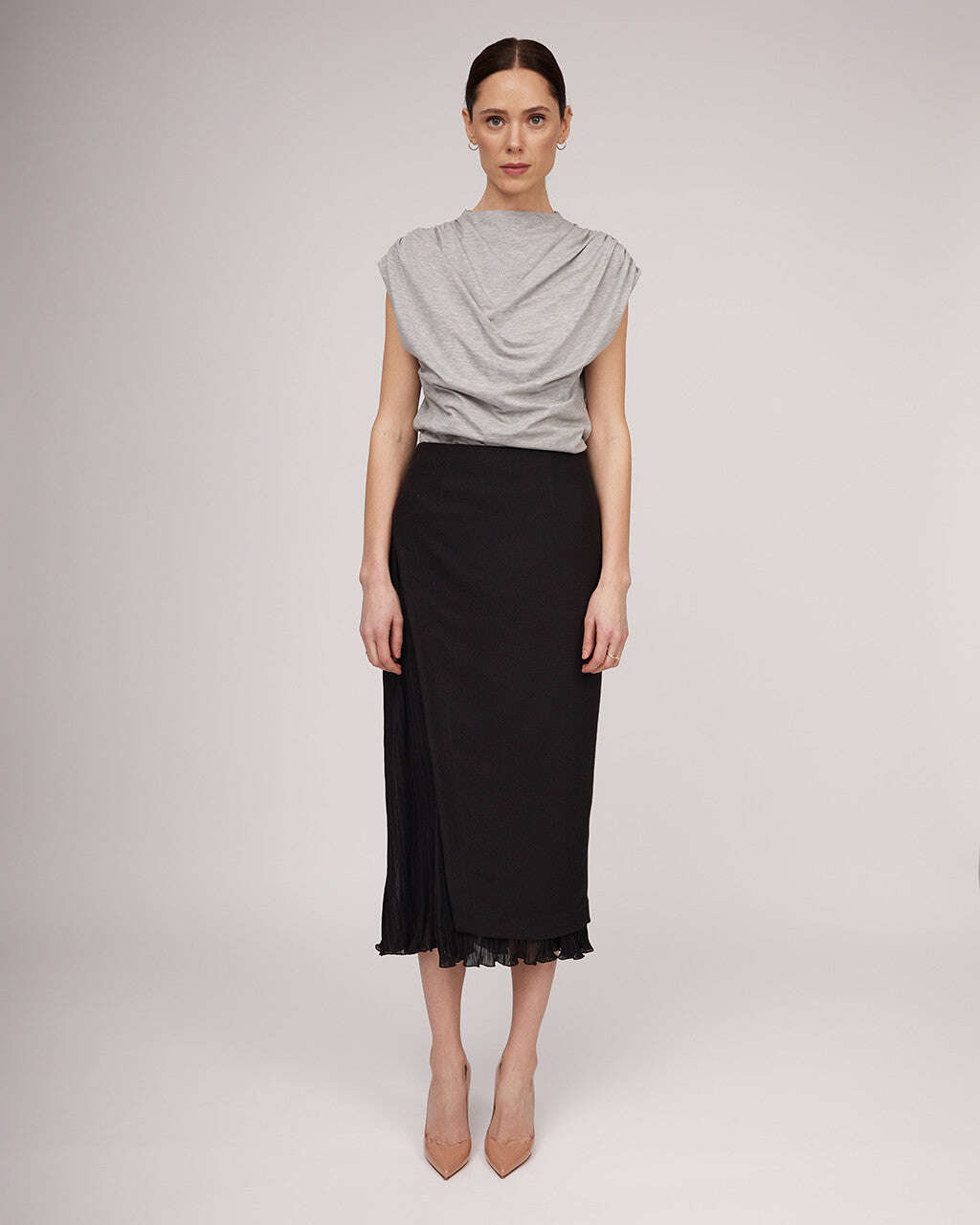 Black midi length skirt with a distinctive silhouette and pleats | IRENE Nolo Store
