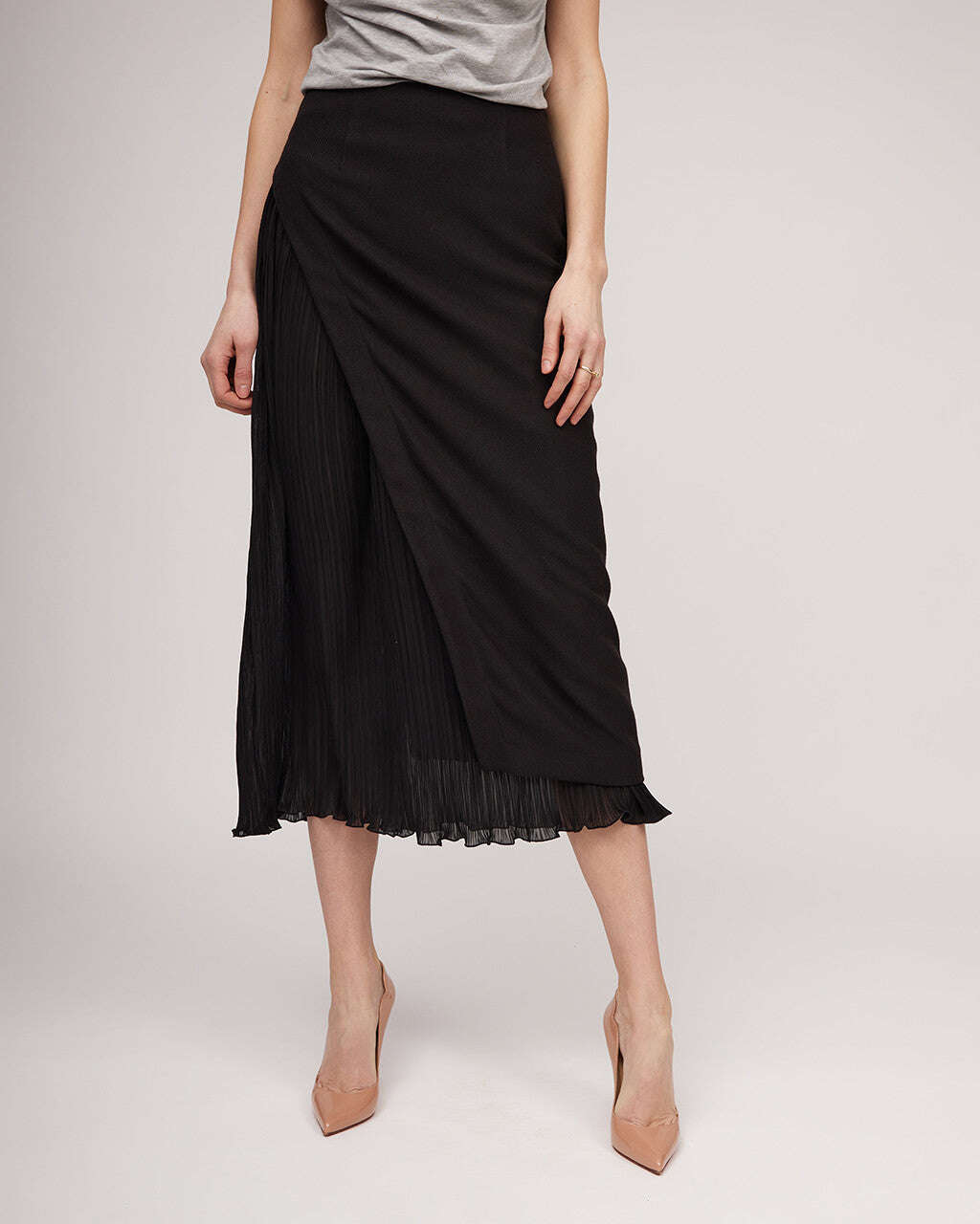 Black midi length skirt with a distinctive silhouette and pleats | IRENE Nolo Store