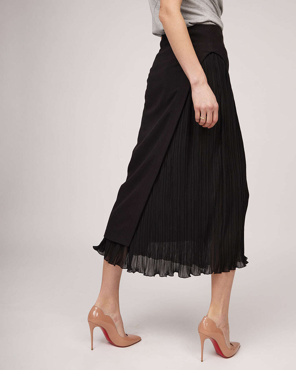 Black midi length skirt with a distinctive silhouette and pleats | IRENE Nolo Store
