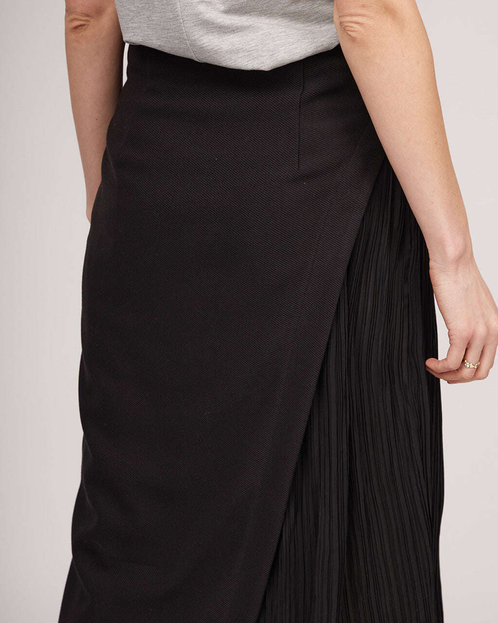 Black midi length skirt with a distinctive silhouette and pleats | IRENE Nolo Store