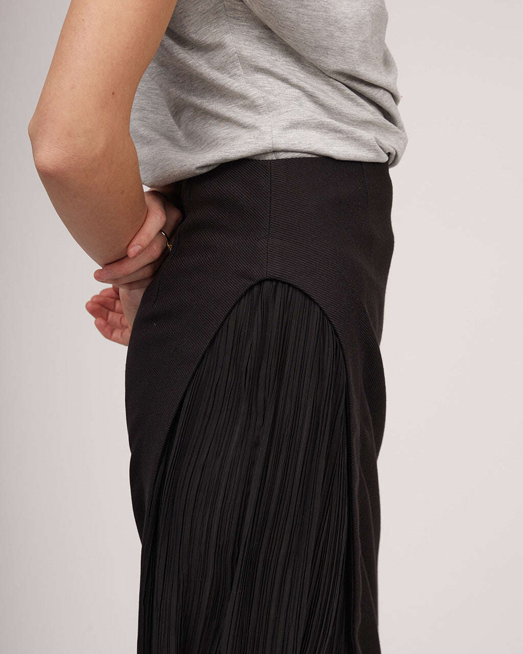 Black midi length skirt with a distinctive silhouette and pleats | IRENE Nolo Store