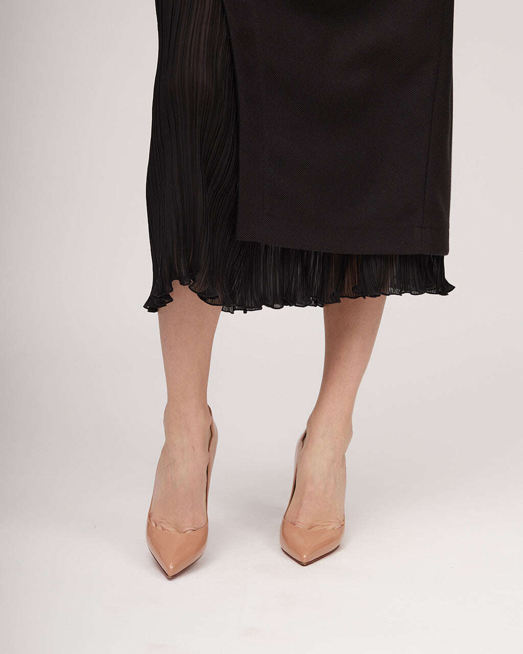 Black midi length skirt with a distinctive silhouette and pleats | IRENE Nolo Store