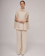 Elegant transparent pleated pants in beige tone with an elastic waistband and jersey shorts | ELDA Nolo Store