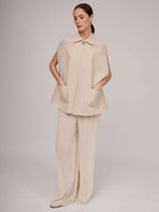 Elegant cream-colored finish with a pronounced fabric texture | YOVANNA Nolo Store