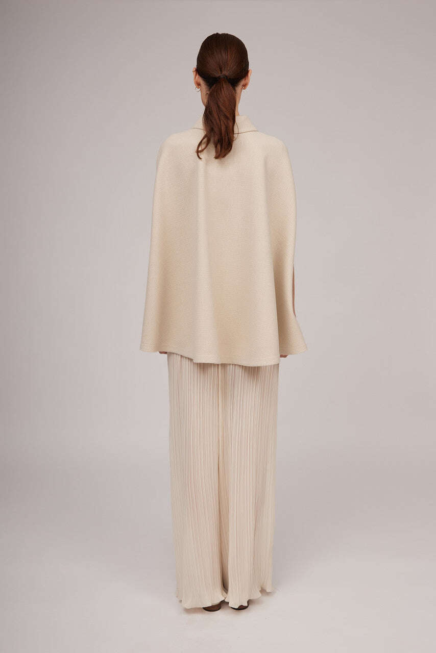 Elegant cream-colored finish with a pronounced fabric texture | YOVANNA Nolo Store