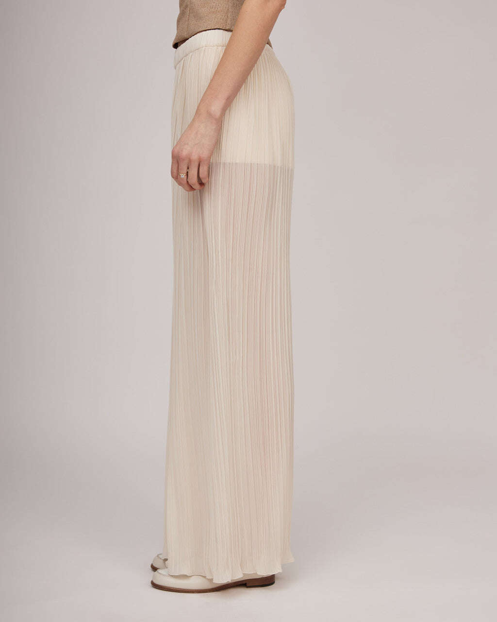 Elegant transparent pleated pants in beige tone with an elastic waistband and jersey shorts | ELDA Nolo Store