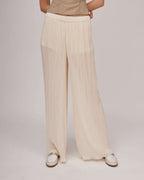 Elegant transparent pleated pants in beige tone with an elastic waistband and jersey shorts | ELDA Nolo Store