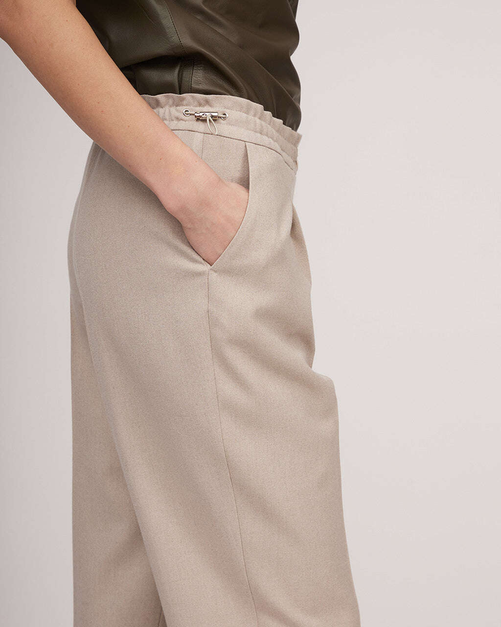 Classic wool trousers with elastic waistband and fasteners | KIARA Nolo Store