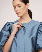 Blue natural silk blouse with puffy sleeves | ELETTRA Nolo Store