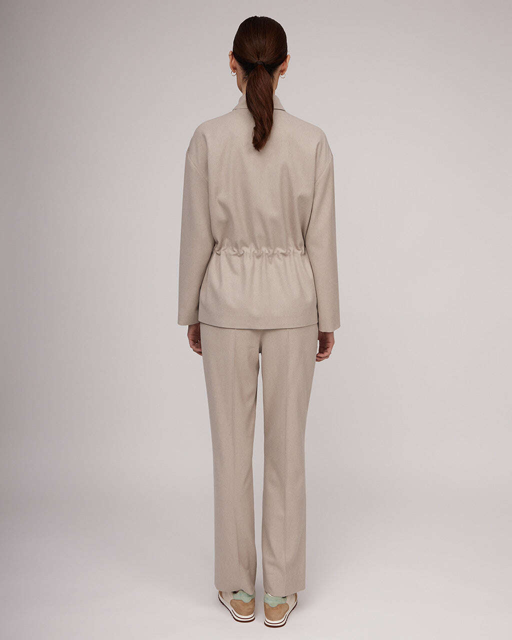 Light beige tweed jacket with a cinched waist | NERINA Nolo Store