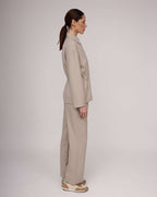 Light beige tweed jacket with a cinched waist | NERINA Nolo Store