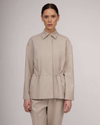 Light beige tweed jacket with a cinched waist | NERINA Nolo Store