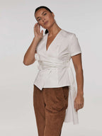 Elegant cotton blouse with belt and accent details | IZENEMI Nolo Store